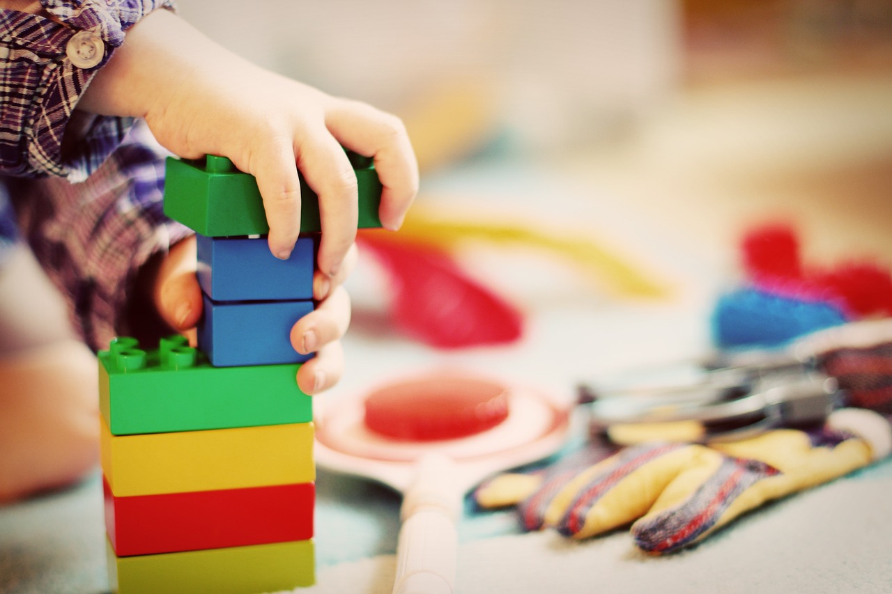christmas background, child, tower, building blocks, blocks, wooden blocks, kindergarten, toy, children, clutter, architecture, to build, to play
