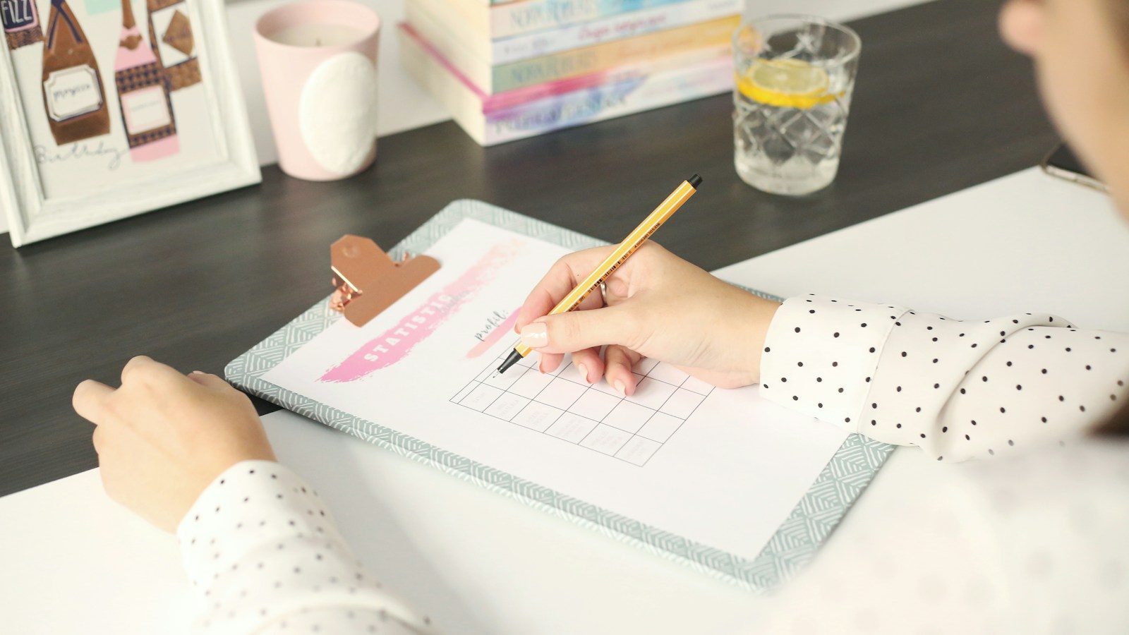 a person drawing on paper